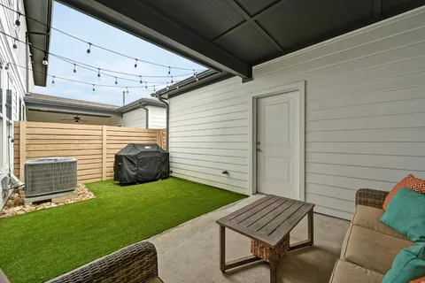 a view of a back yard of the house