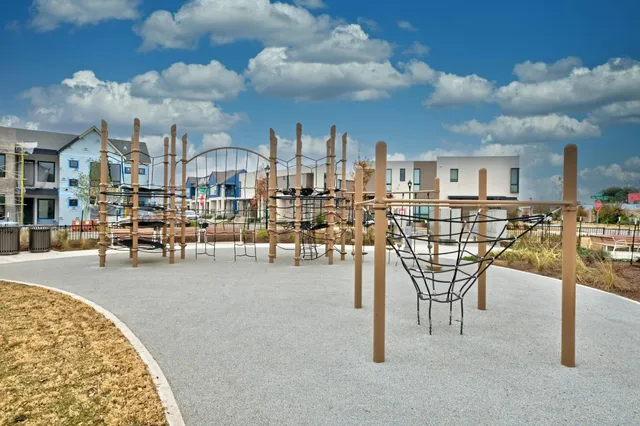 a view of a swimming pool with outdoor seating