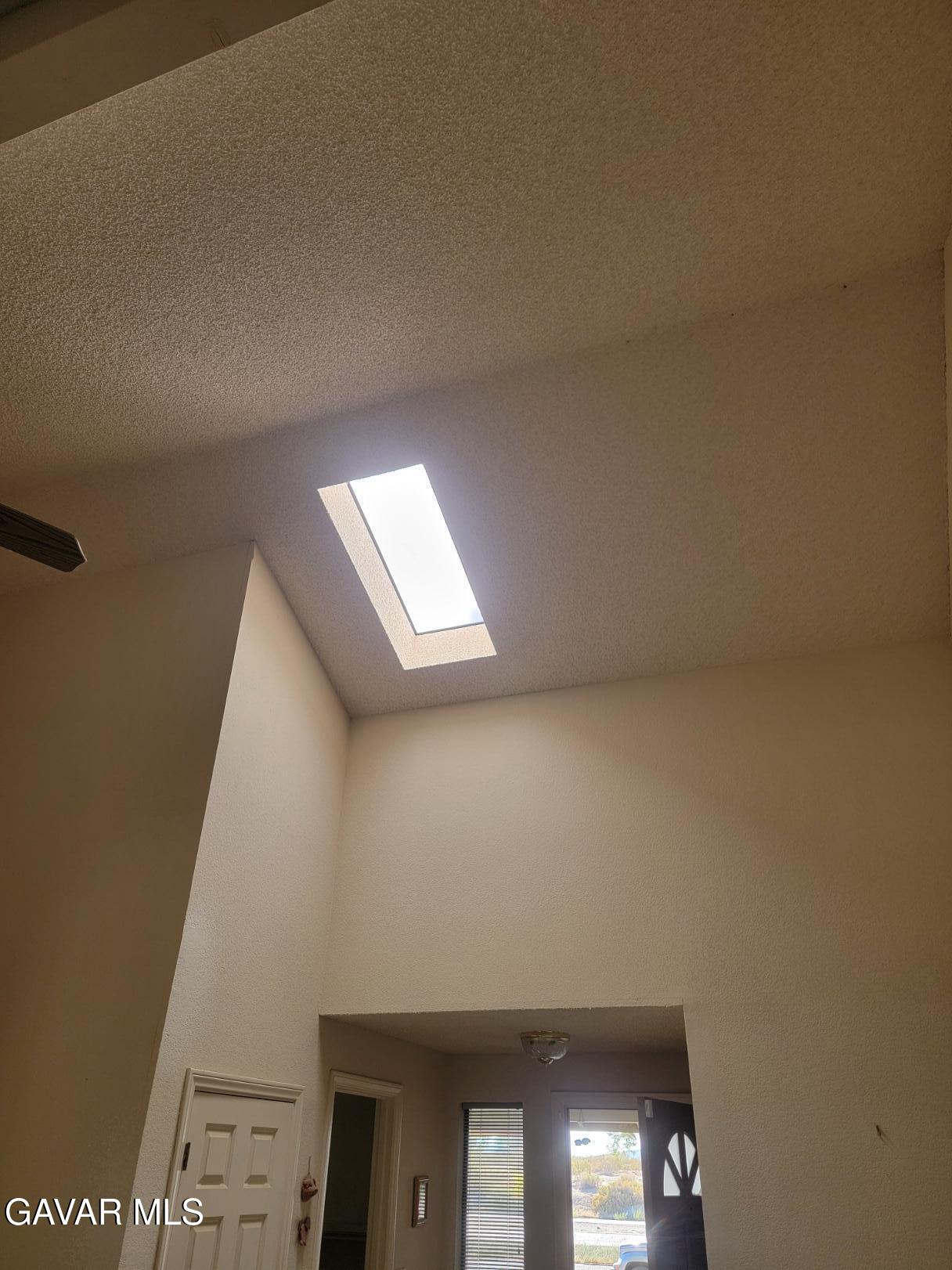 21481 Randsburg Mojave Road California City, CA 93505 - Photo 10 of 28 a view of an empty room with windows