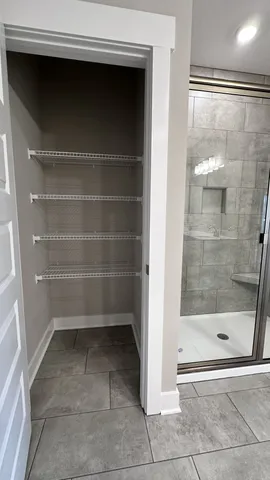 a bathroom with a sink a toilet and bathtub