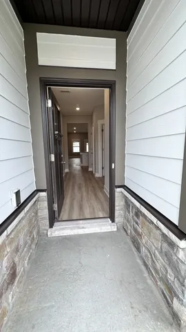 a view of a kitchen with sink stainless steel appliances and cabinets