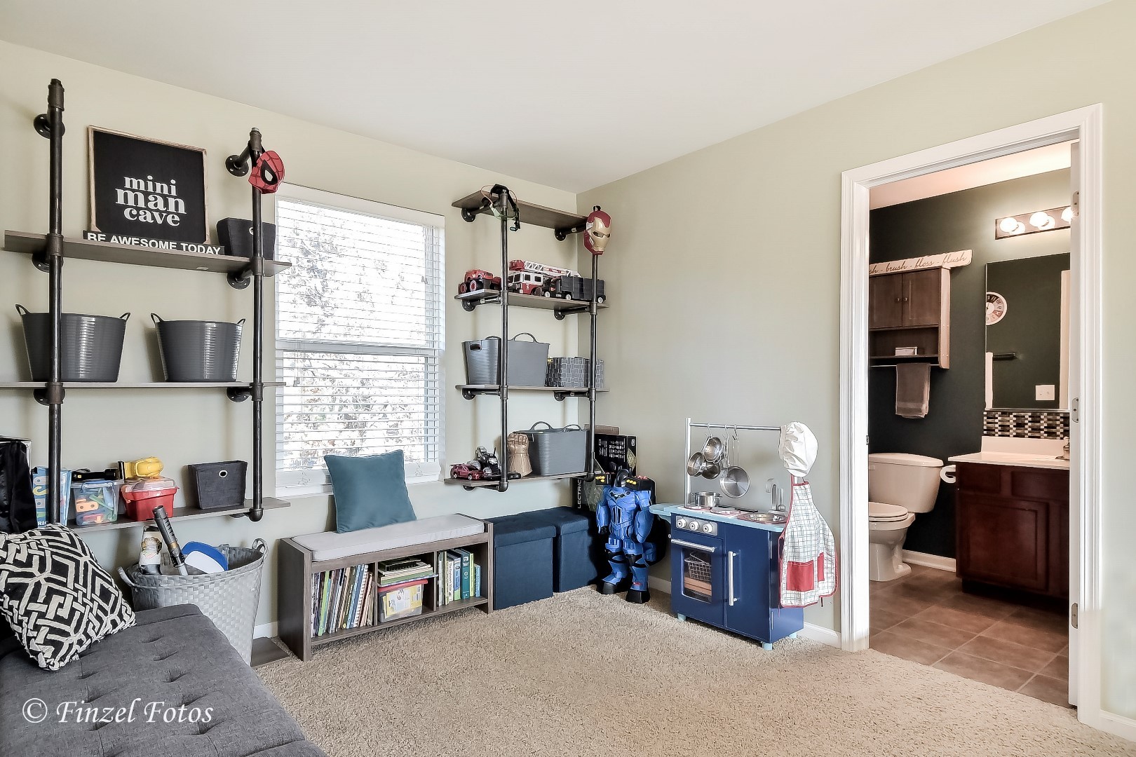1912 Roger Road Woodstock, IL 60098 - Photo 14 of 21 a living room with furniture and a flat screen tv