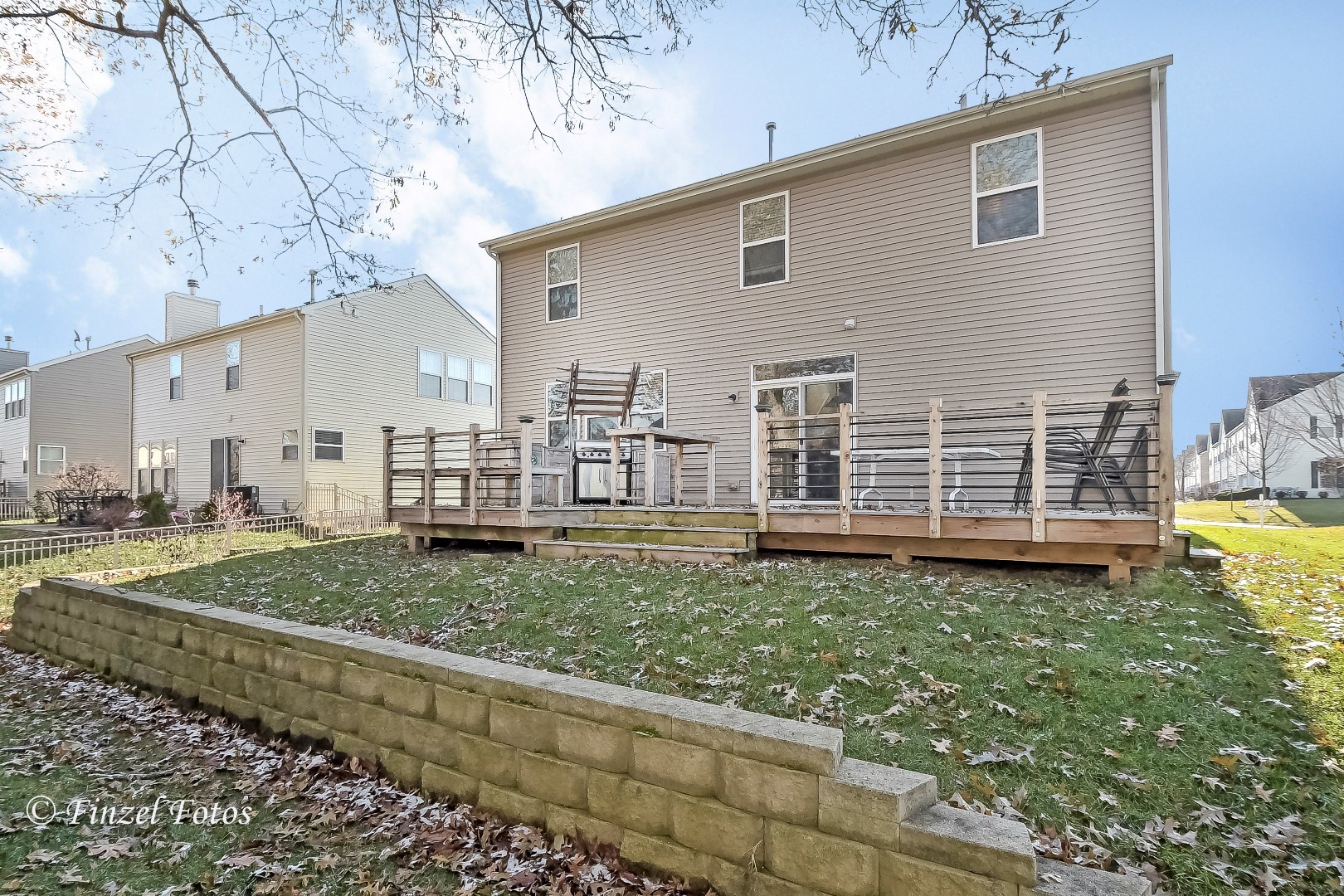 1912 Roger Road Woodstock, IL 60098 - Photo 20 of 21 a view of a house with a yard