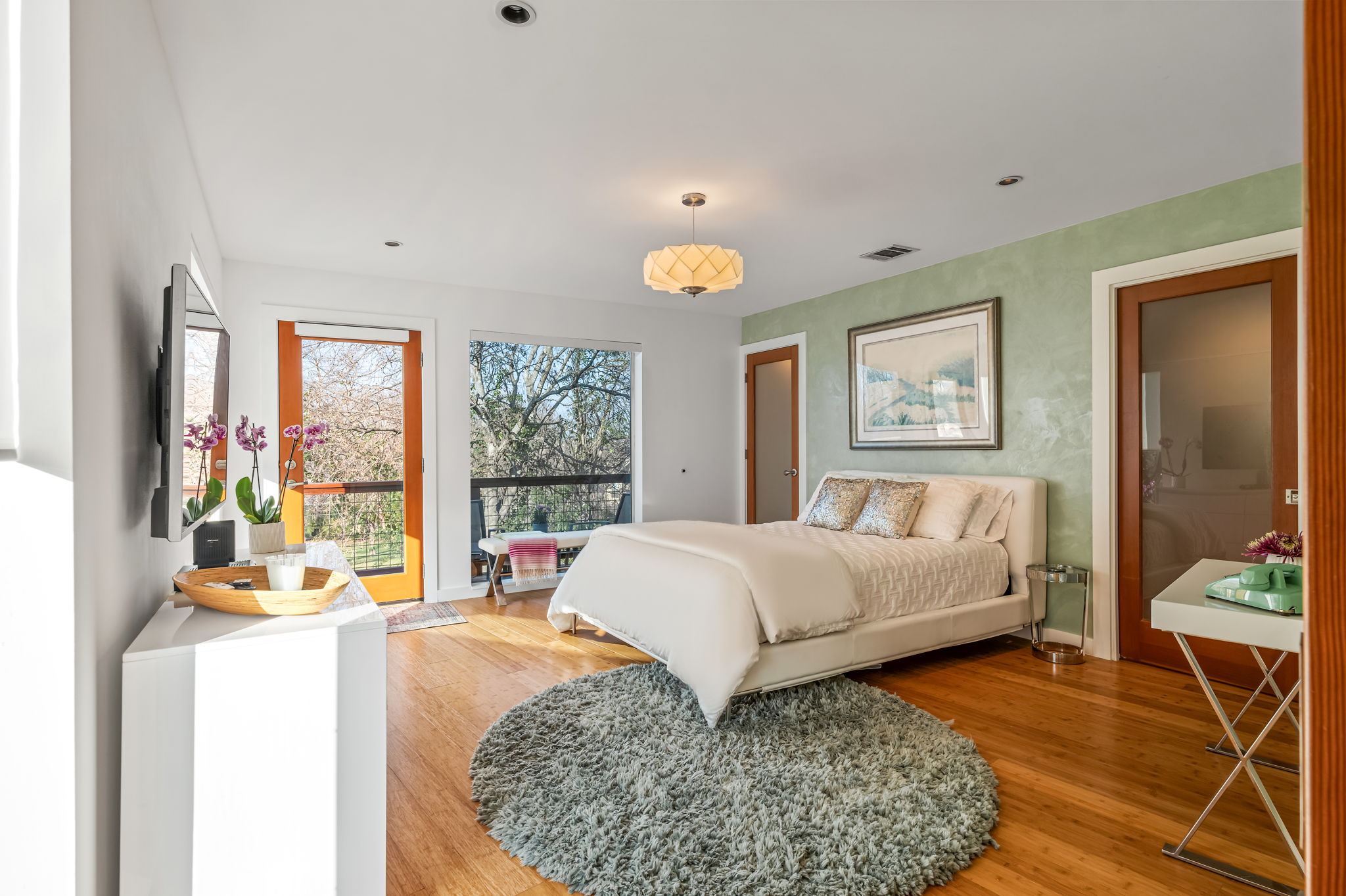 1700 Ravey Street, Unit A Austin, TX 78704 - Photo 15 of 40 Bedroom featuring light wood-type flooring and recessed lighting