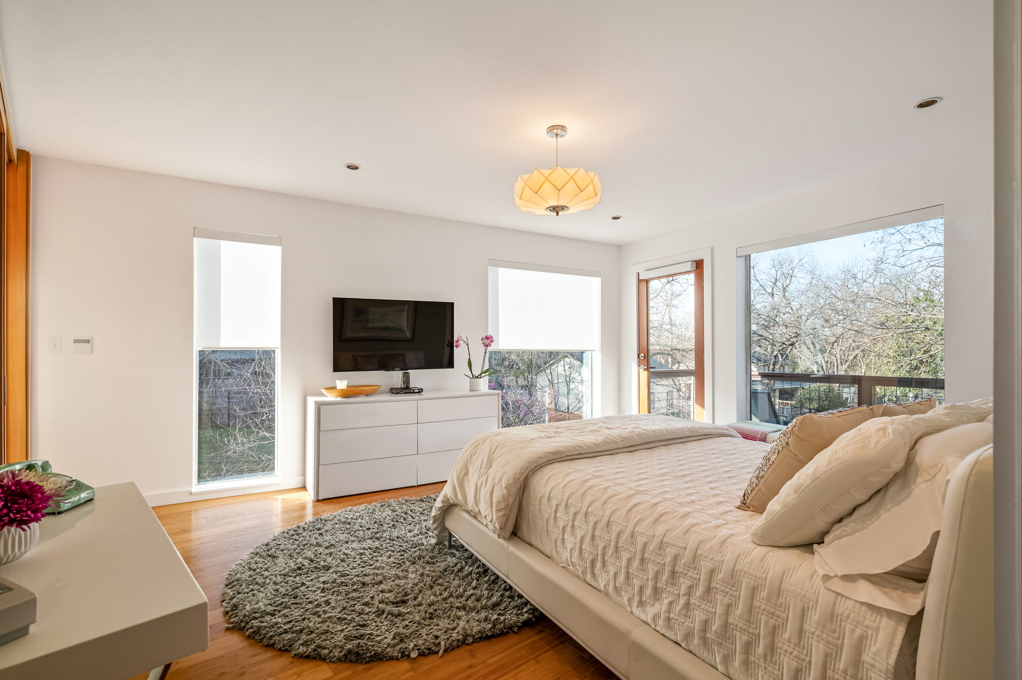 1700 Ravey Street, Unit A Austin, TX 78704 - Photo 16 of 40 Bedroom featuring light wood-type flooring