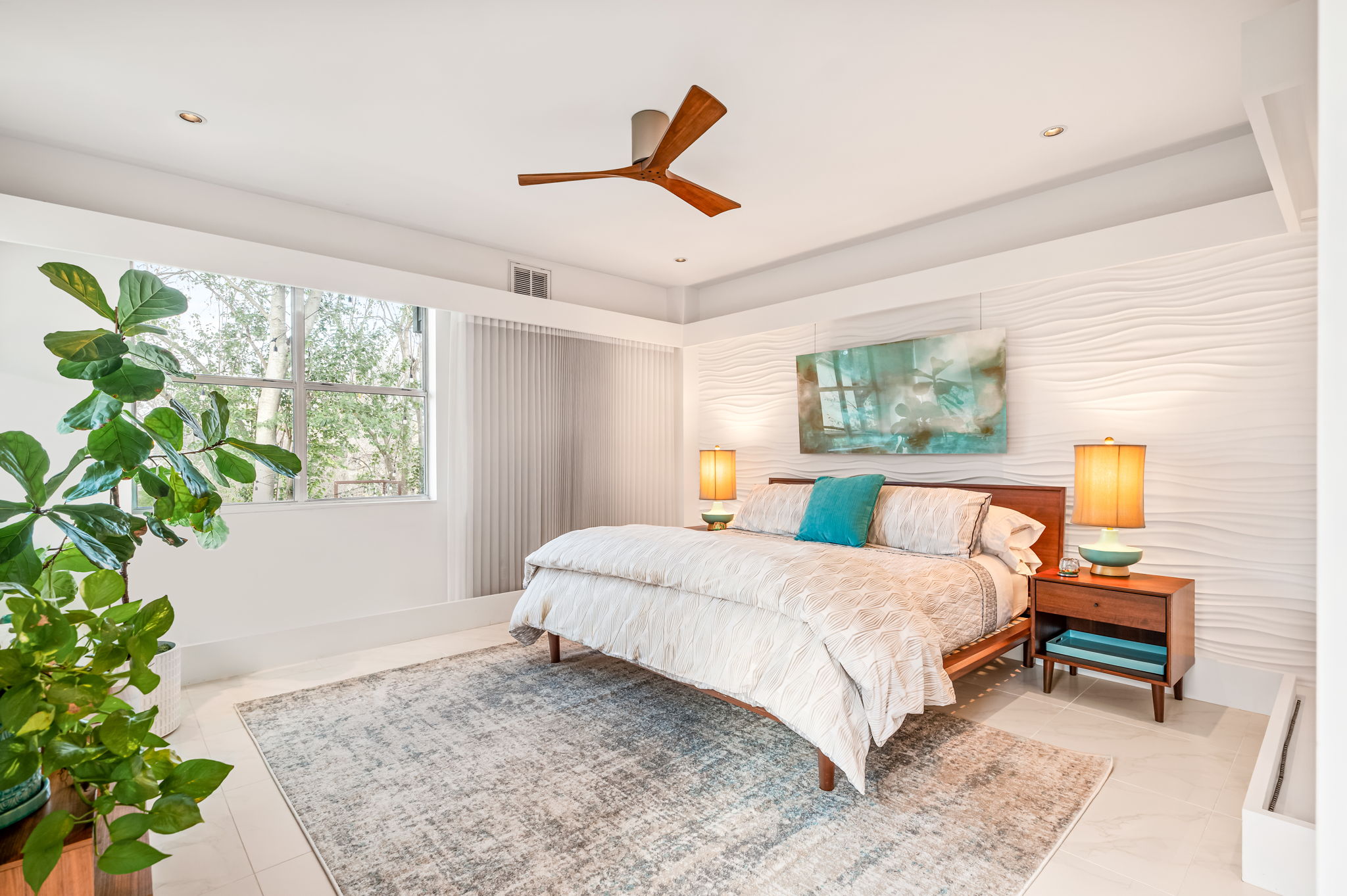 1700 Ravey Street, Unit A Austin, TX 78704 - Photo 23 of 40 Primary Bedroom with a ceiling fan