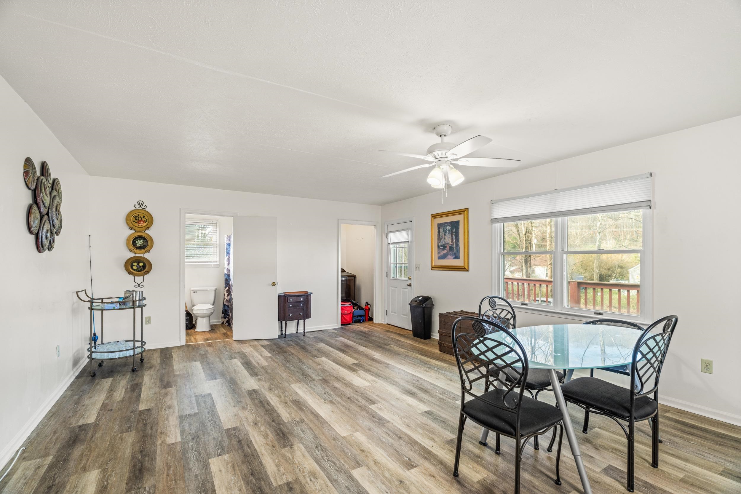 1316 East Main Street Waynesboro, VA 22980 - Photo 14 of 34 a living room with furniture and a window