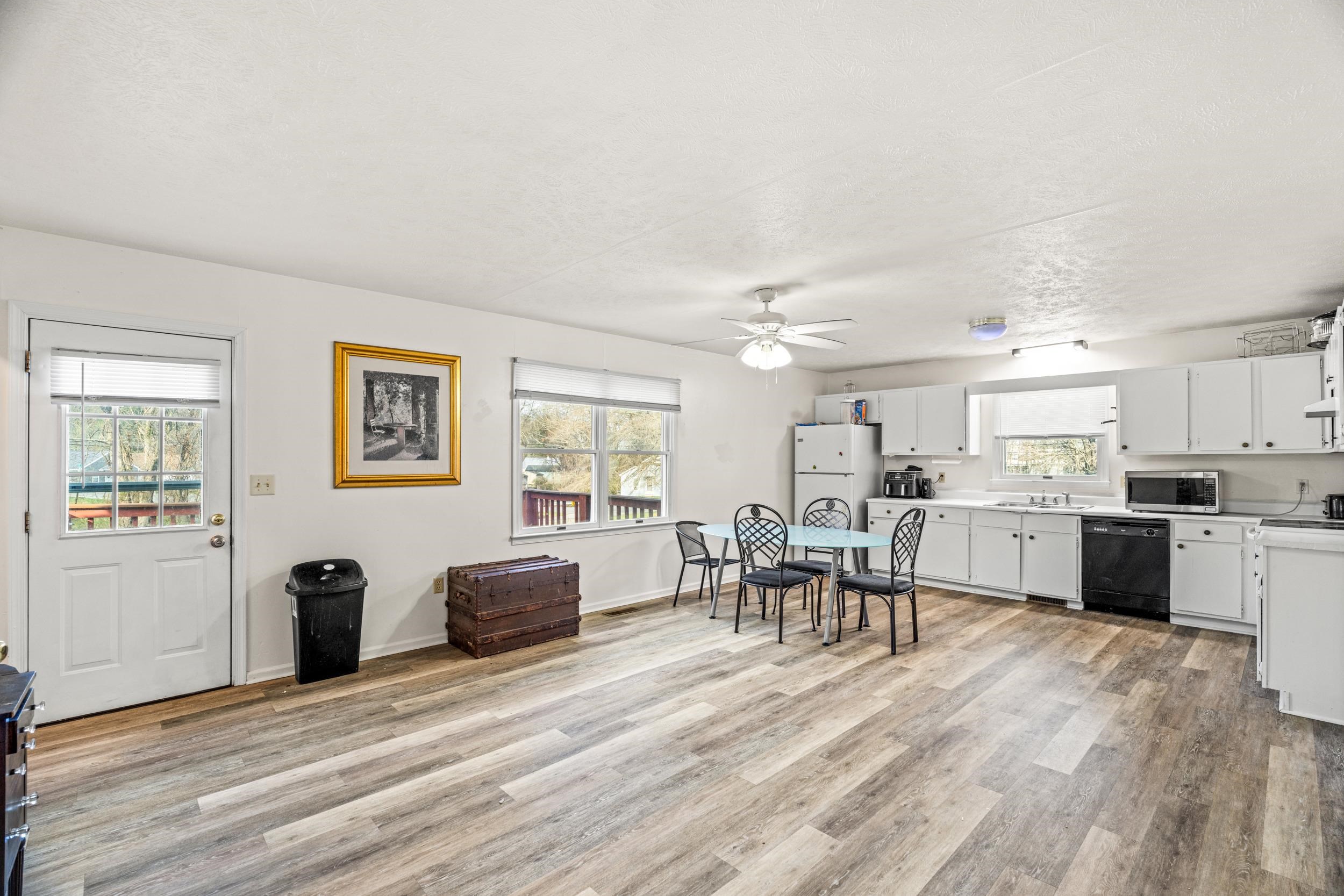 1316 East Main Street Waynesboro, VA 22980 - Photo 15 of 34 a living room with furniture and a wooden floor