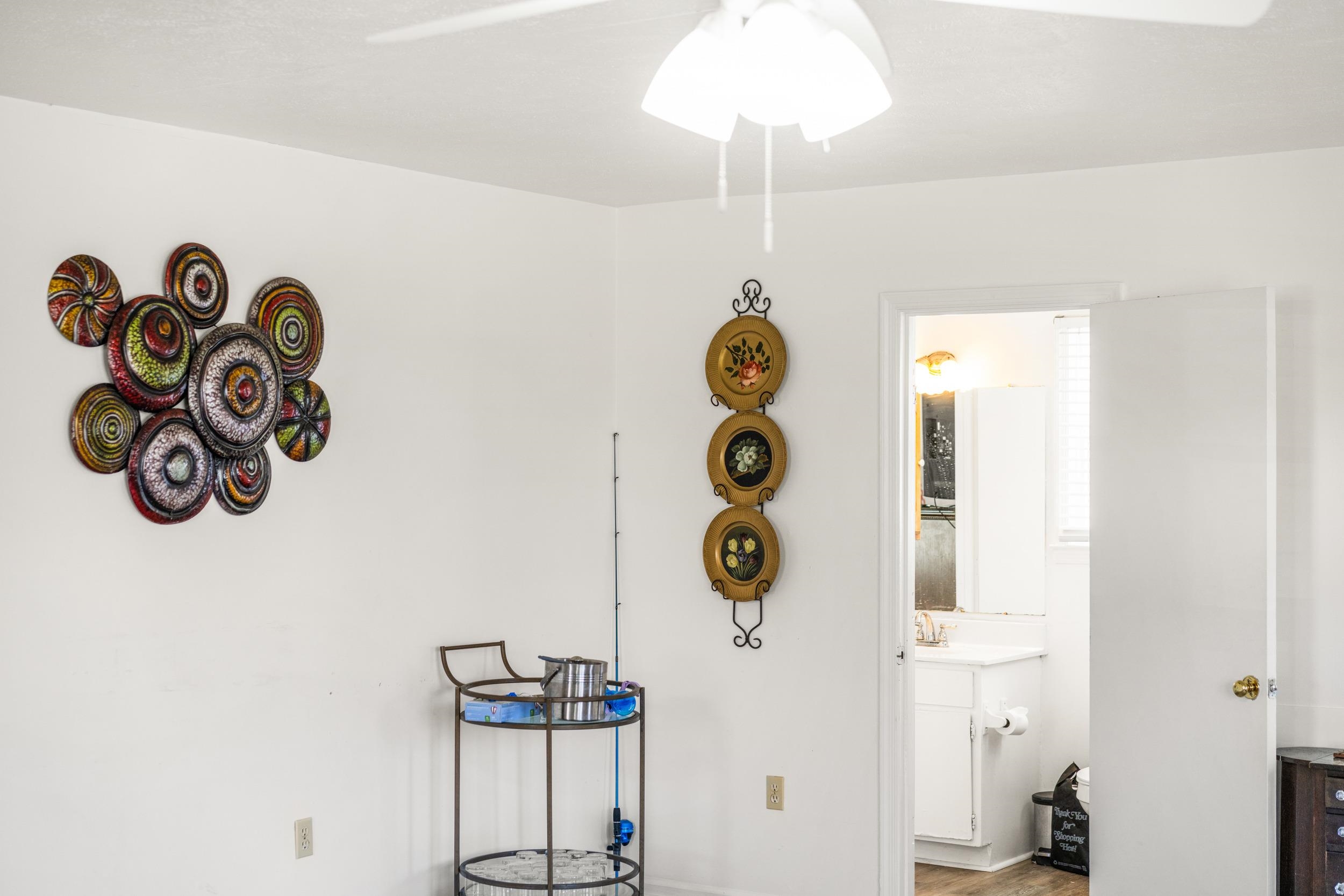 1316 East Main Street Waynesboro, VA 22980 - Photo 20 of 34 a view of a hallway with window and chandelier
