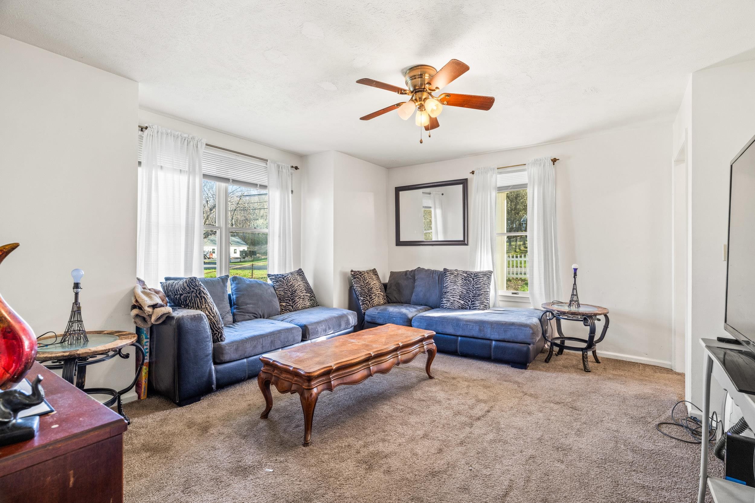 1316 East Main Street Waynesboro, VA 22980 - Photo 21 of 34 a living room with furniture and a window