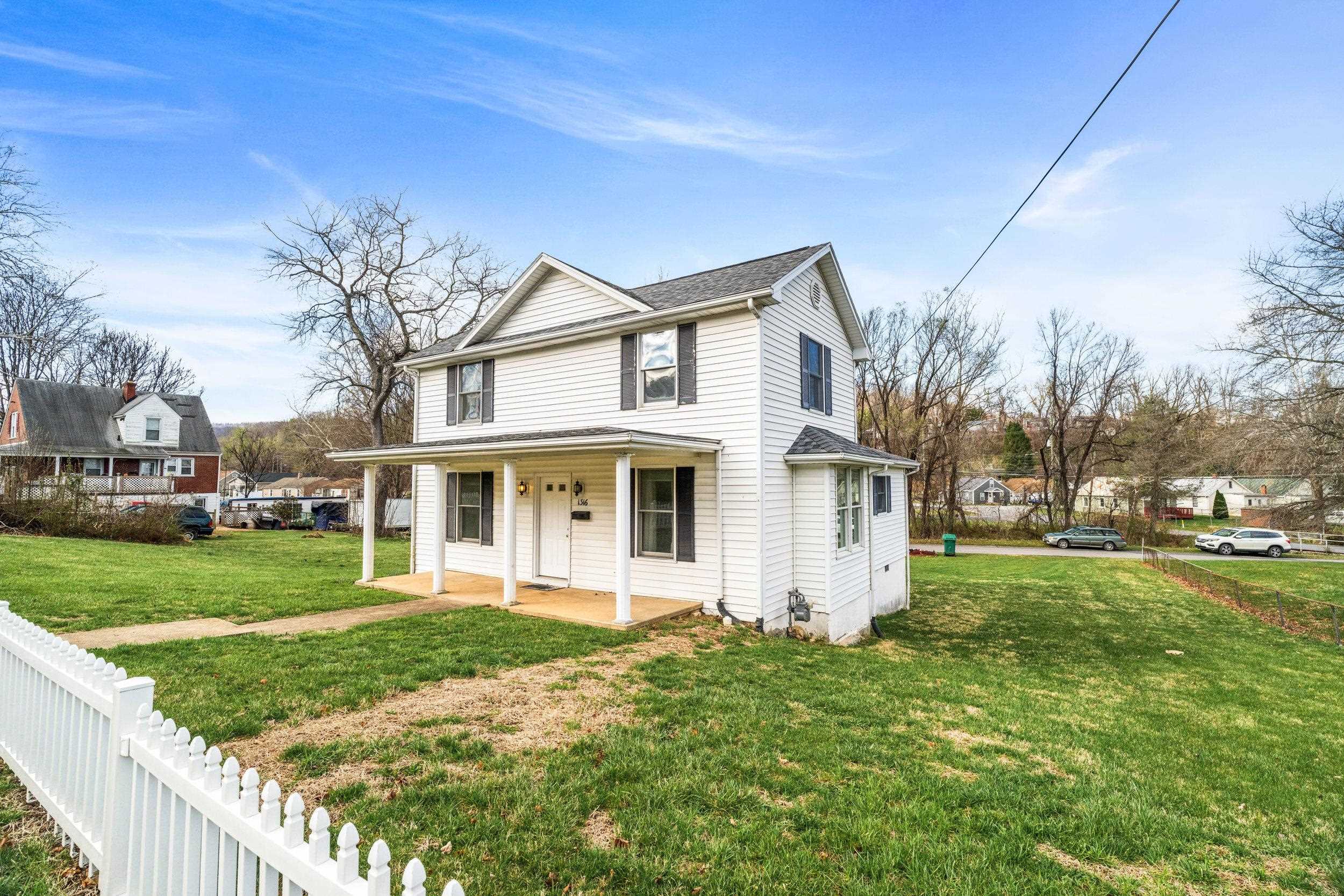 1316 East Main Street Waynesboro, VA 22980 - Photo 10 of 34 a front view of a house with a yard