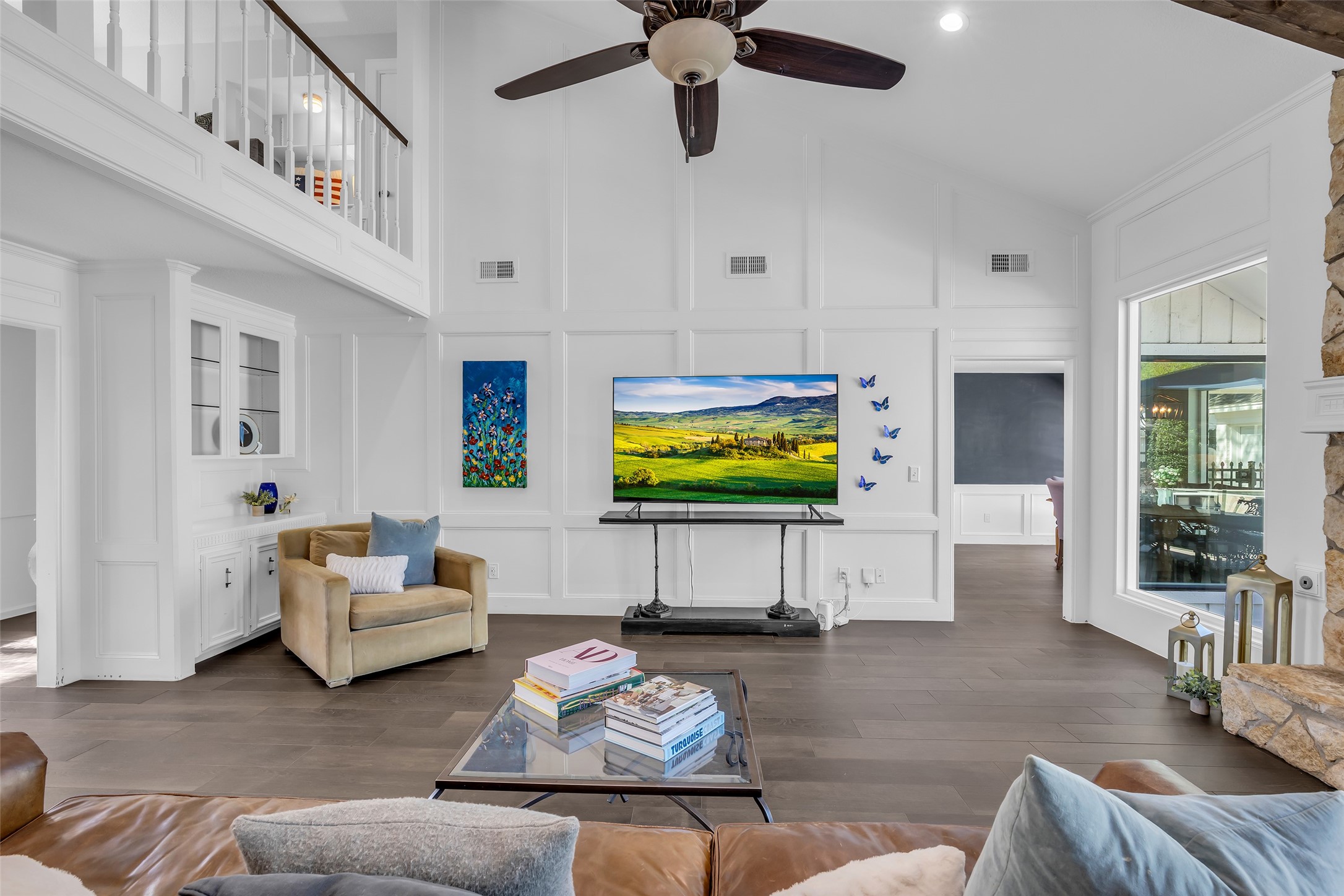 9318 Appin Falls Drive Spring, TX 77379 - Photo 13 of 35 a living room with furniture and a flat screen tv