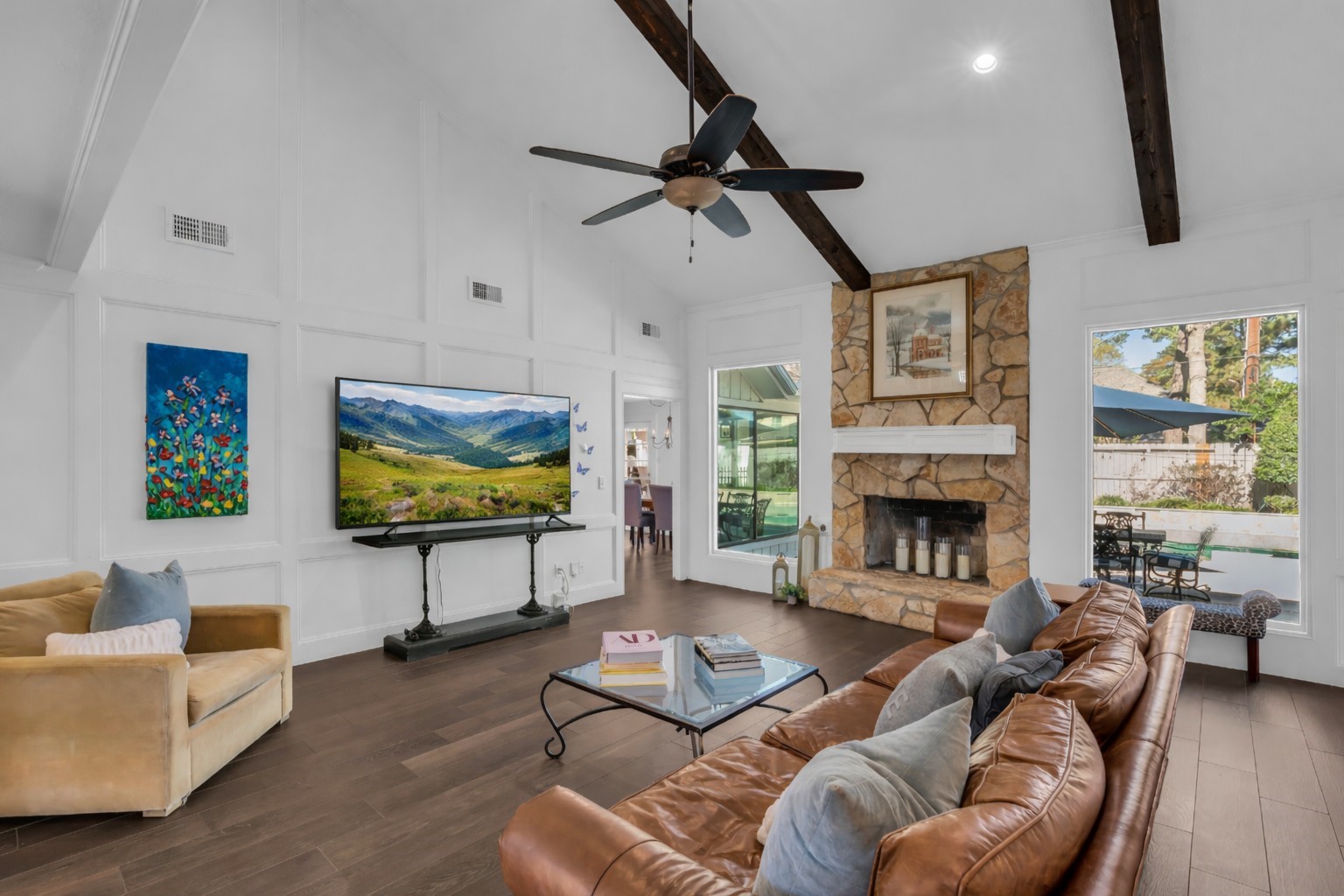9318 Appin Falls Drive Spring, TX 77379 - Photo 14 of 35 a living room with furniture and a flat screen tv