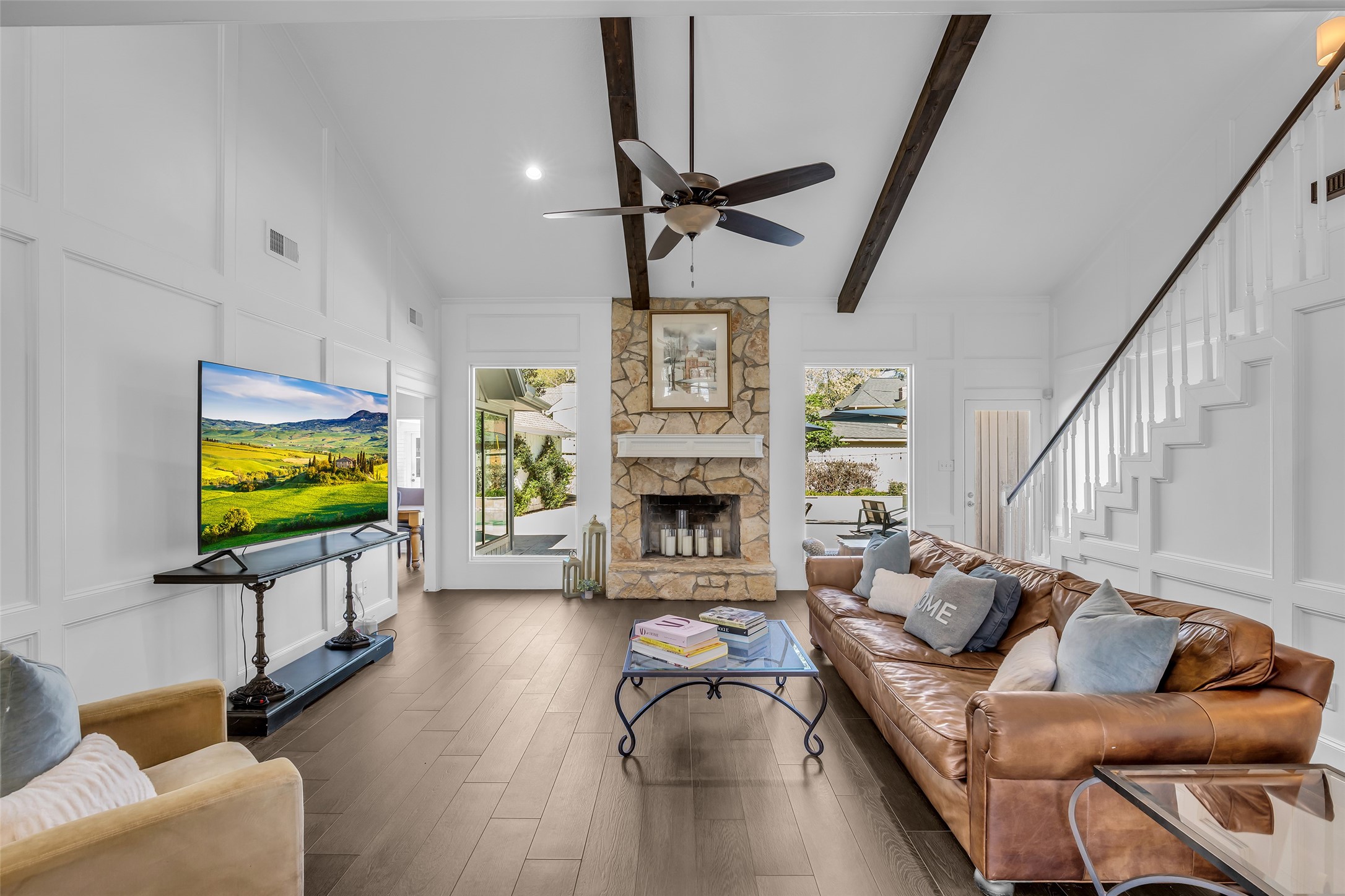 9318 Appin Falls Drive Spring, TX 77379 - Photo 15 of 35 a living room with furniture fireplace and a flat screen tv