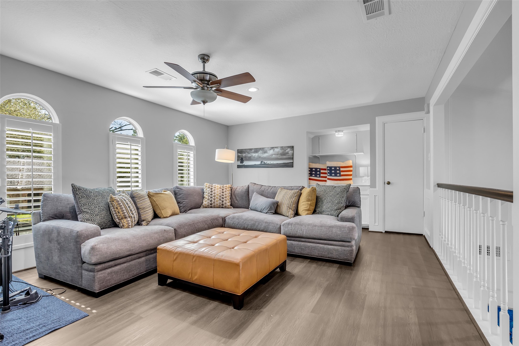 9318 Appin Falls Drive Spring, TX 77379 - Photo 24 of 35 a living room with furniture ceiling fan and a window