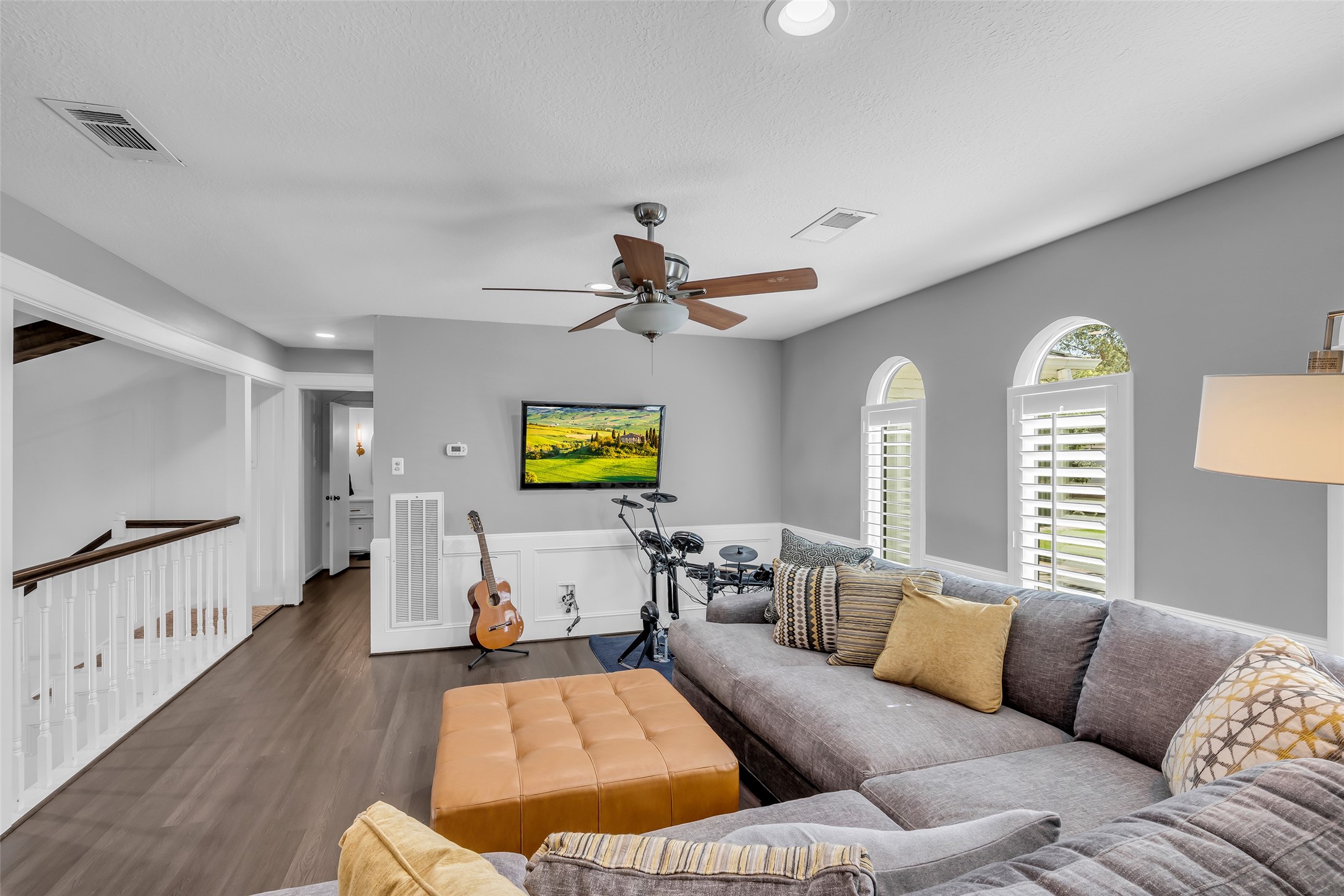 9318 Appin Falls Drive Spring, TX 77379 - Photo 25 of 35 a living room with furniture and wooden floor