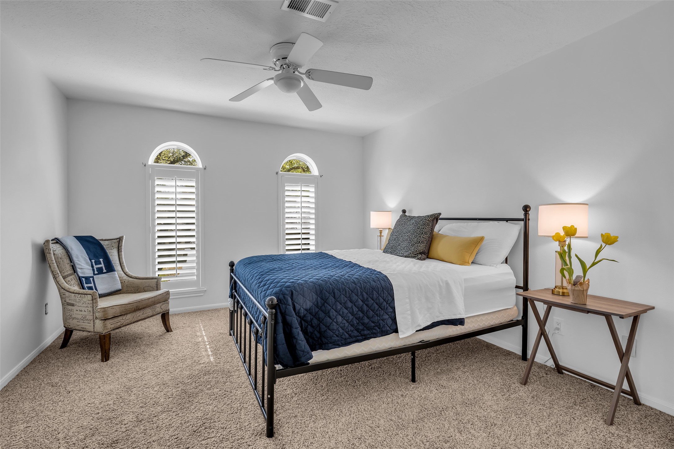 9318 Appin Falls Drive Spring, TX 77379 - Photo 28 of 35 a bedroom with a bed chair and window