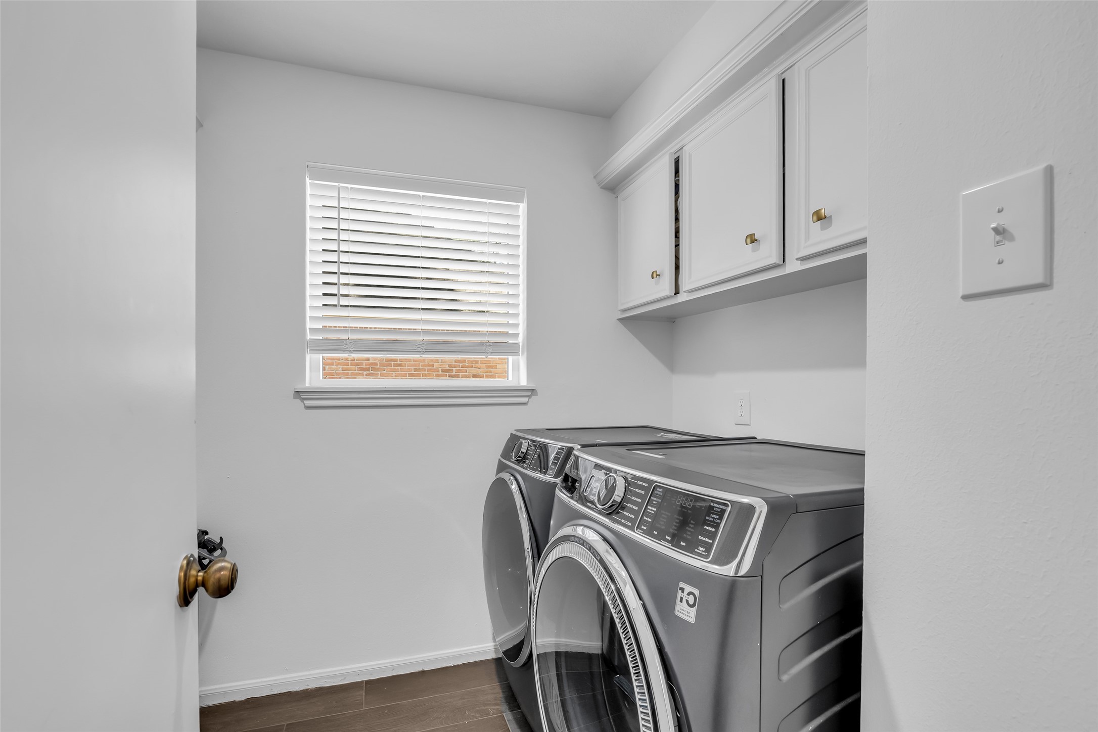 9318 Appin Falls Drive Spring, TX 77379 - Photo 34 of 35 a utility room with dryer and washer