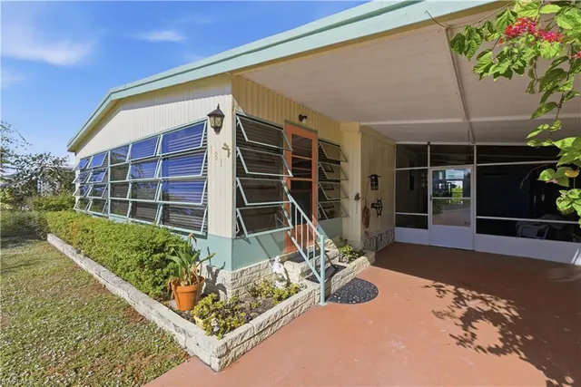 a house with trees in front of it