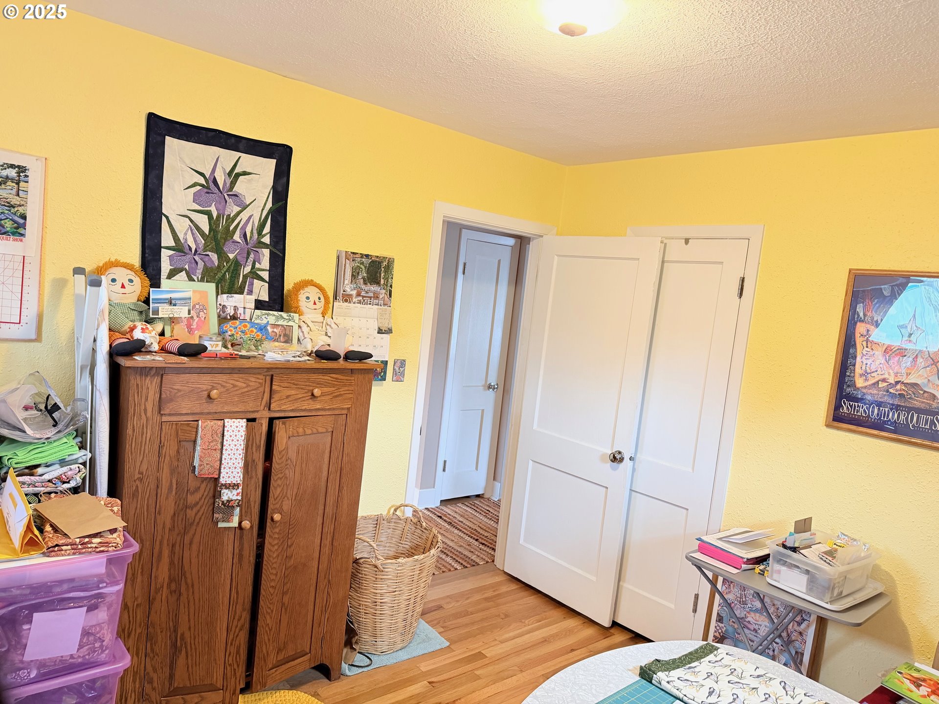 114 Maple Boulevard Wood Village, OR 97060 - Photo 13 of 23 a bed room with a bed and a mirror