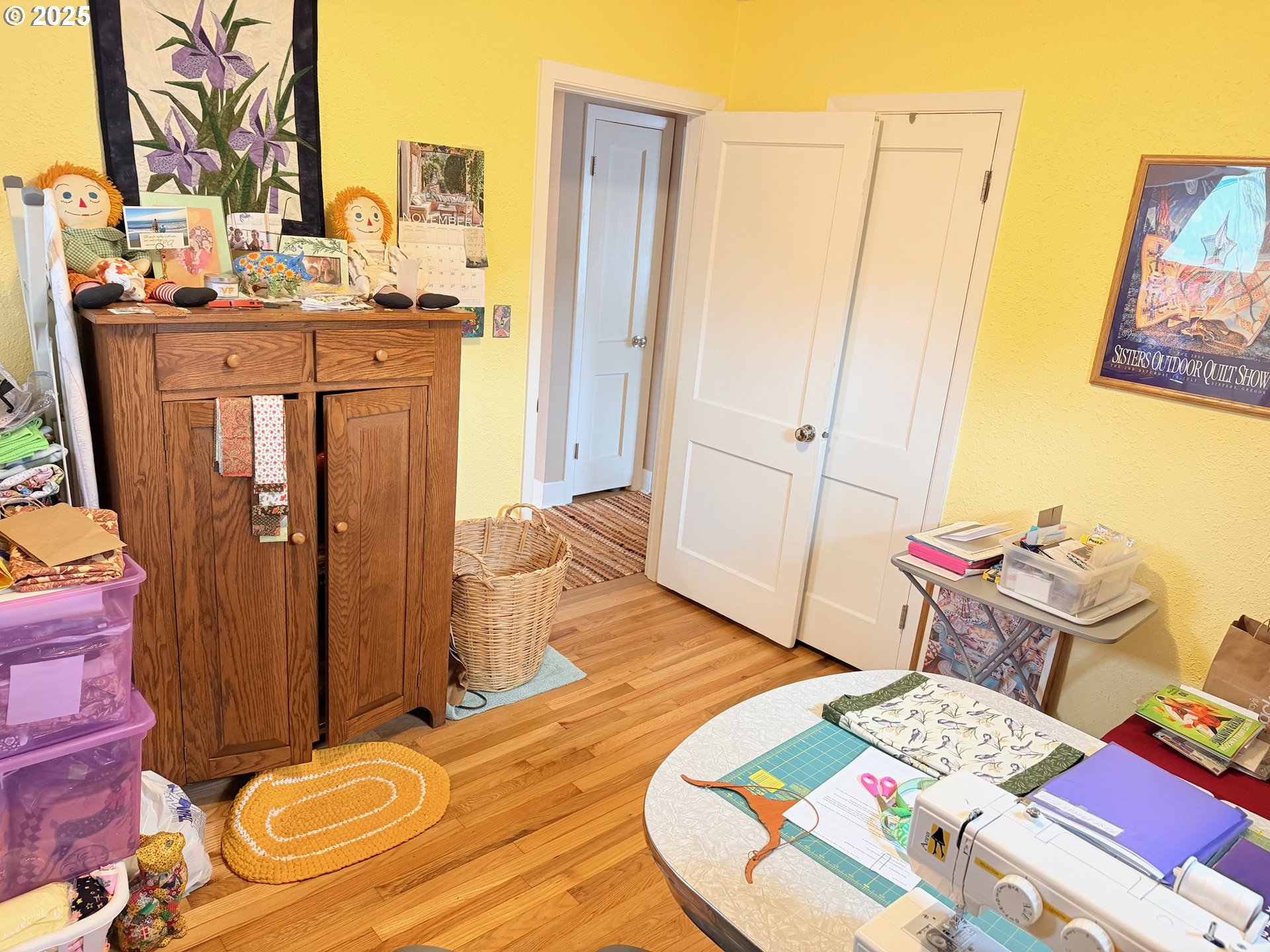 114 Maple Boulevard Wood Village, OR 97060 - Photo 14 of 23 a bed room with a bed and a table