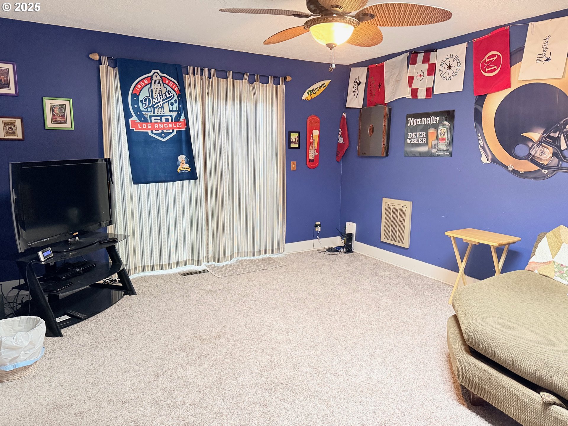 114 Maple Boulevard Wood Village, OR 97060 - Photo 16 of 23 a bedroom with furniture and a flat screen tv