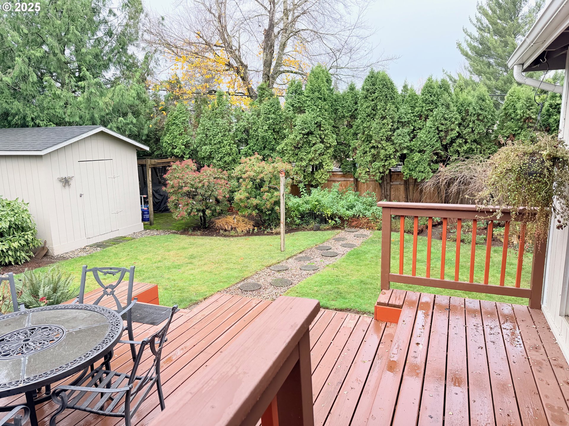 114 Maple Boulevard Wood Village, OR 97060 - Photo 18 of 23 a view of a wooden deck and a backyard