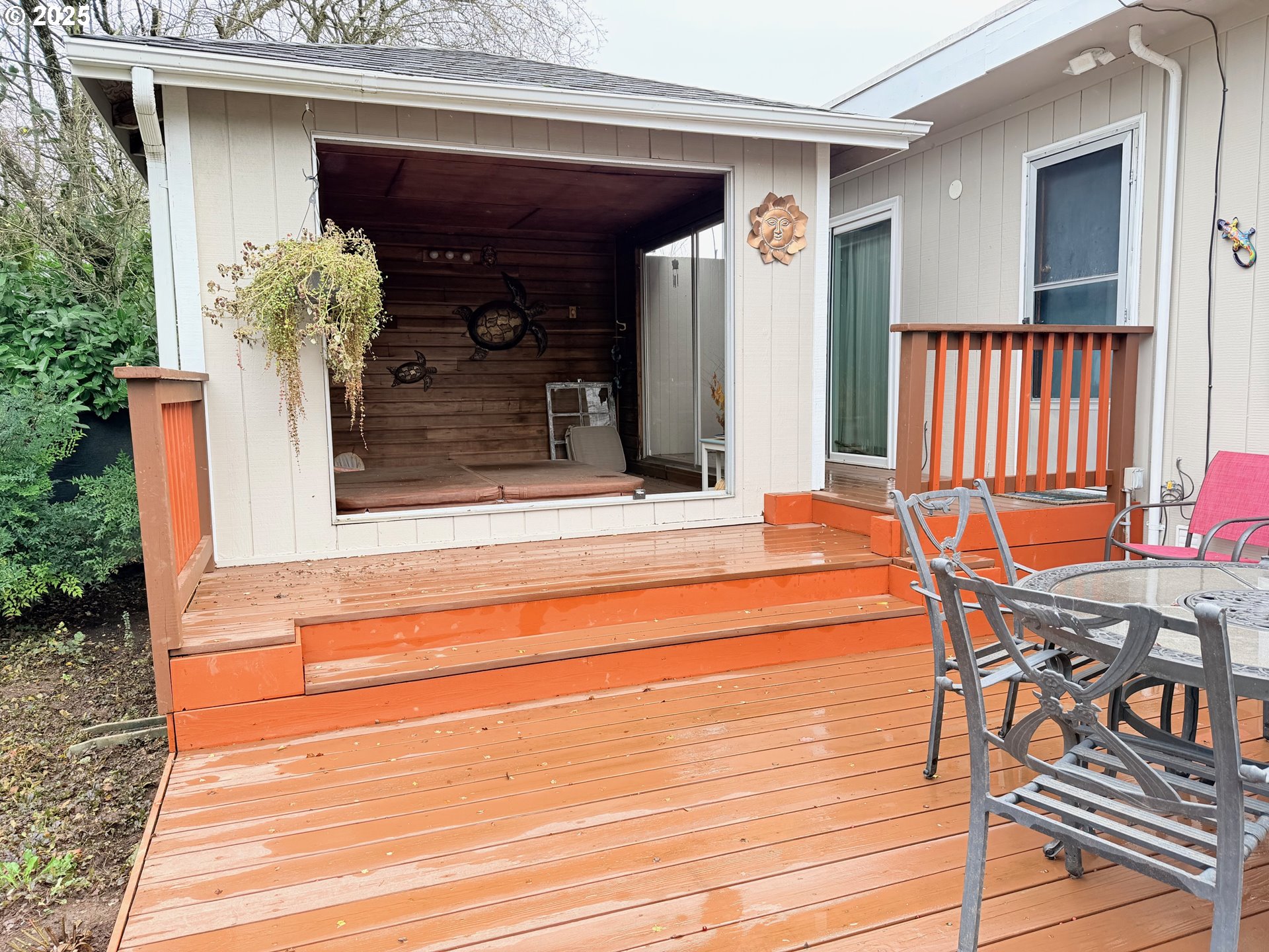 114 Maple Boulevard Wood Village, OR 97060 - Photo 20 of 23 a patio with table and chairs and potted plants