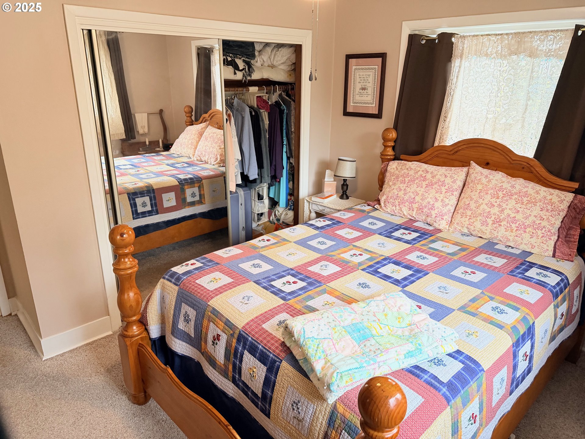 114 Maple Boulevard Wood Village, OR 97060 - Photo 5 of 23 a bedroom with a bed and a mirror on dresser