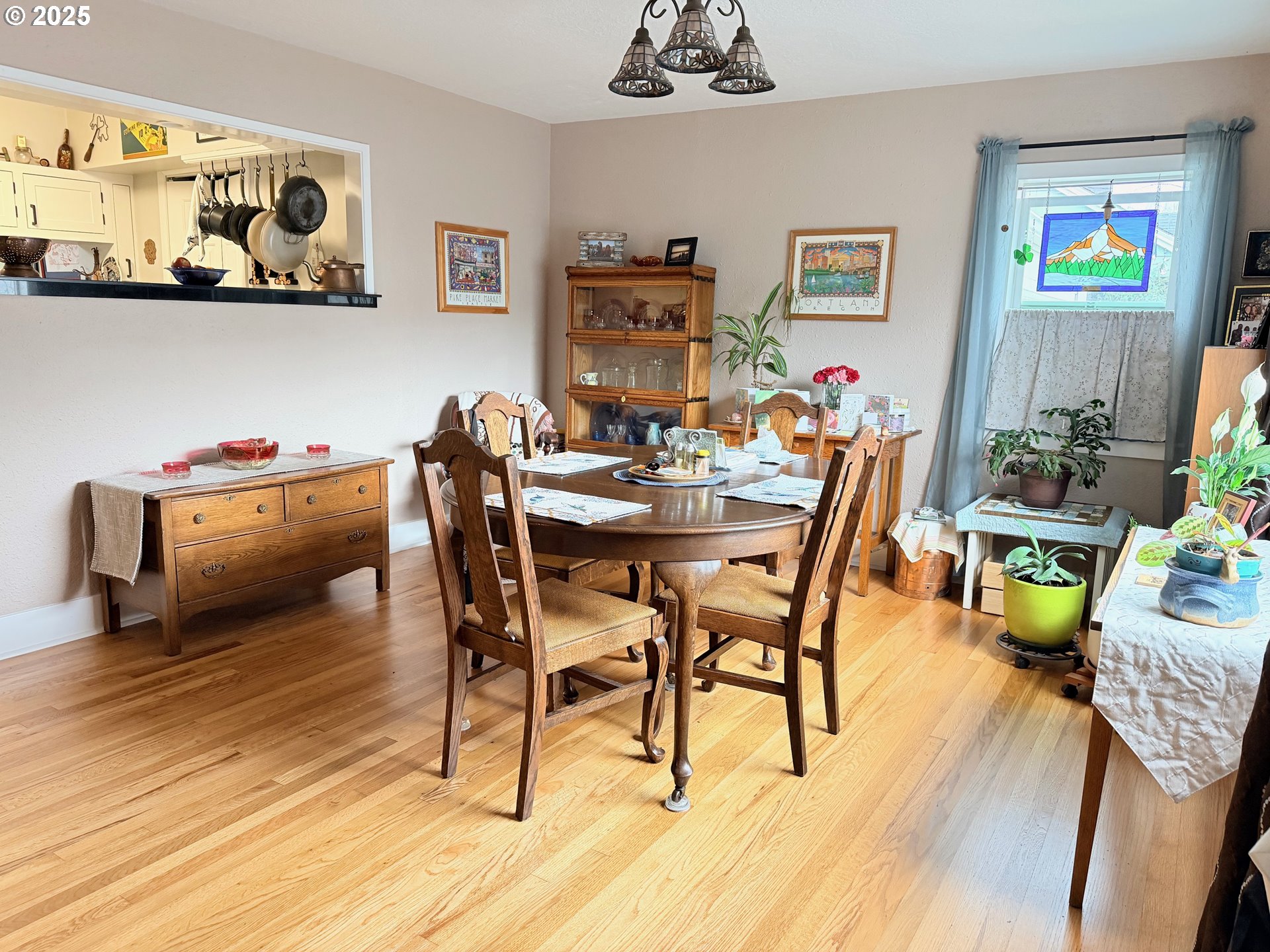114 Maple Boulevard Wood Village, OR 97060 - Photo 8 of 23 a dining room with furniture and wooden floor
