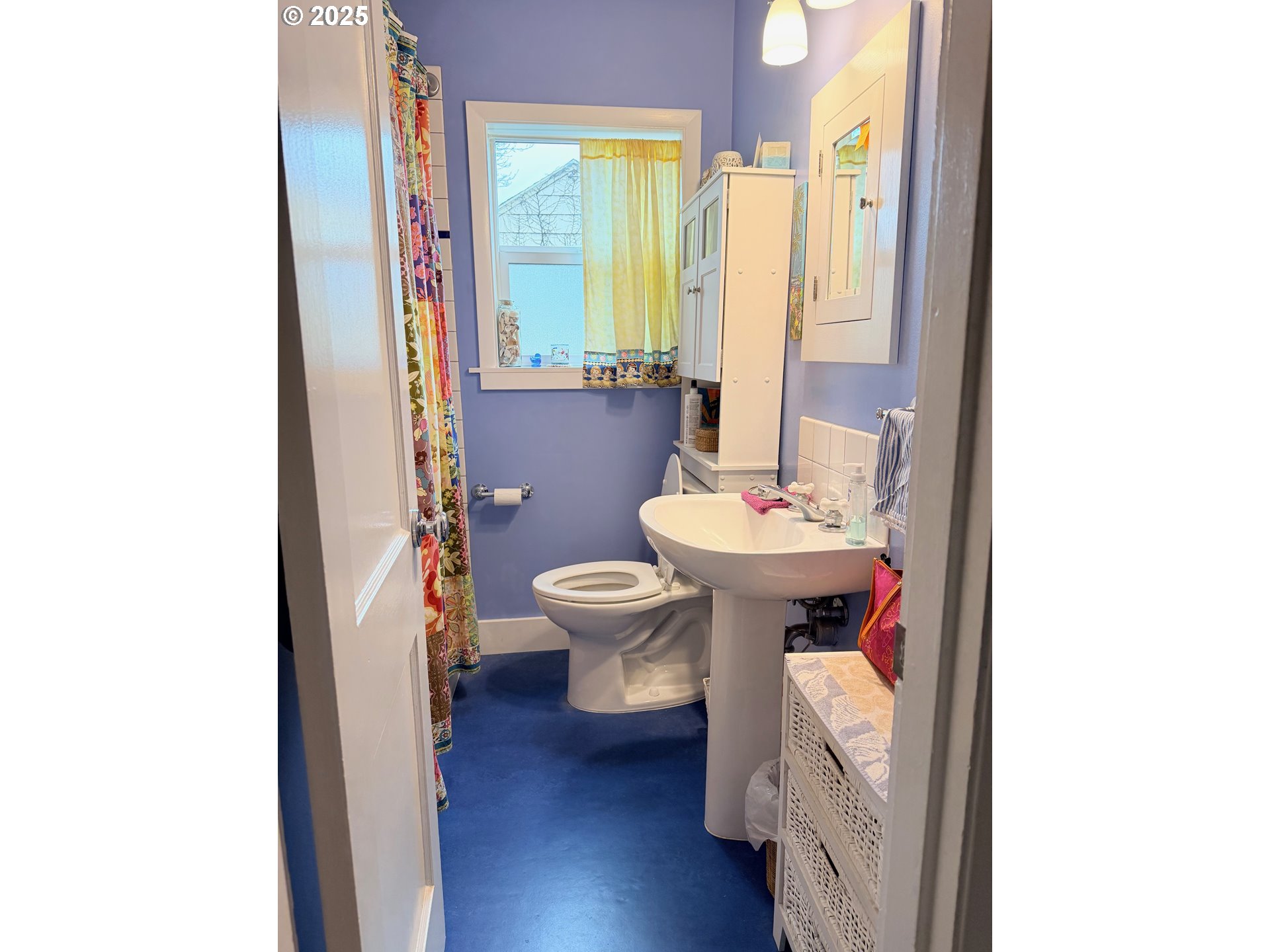 114 Maple Boulevard Wood Village, OR 97060 - Photo 9 of 23 a bathroom with a toilet sink and mirror