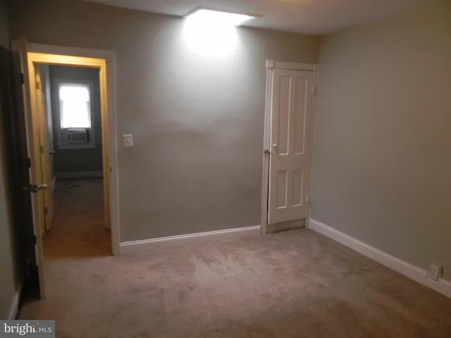 a bathroom with a mirror