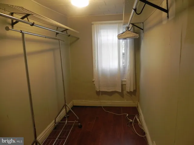 a bathroom with a shower and toilet