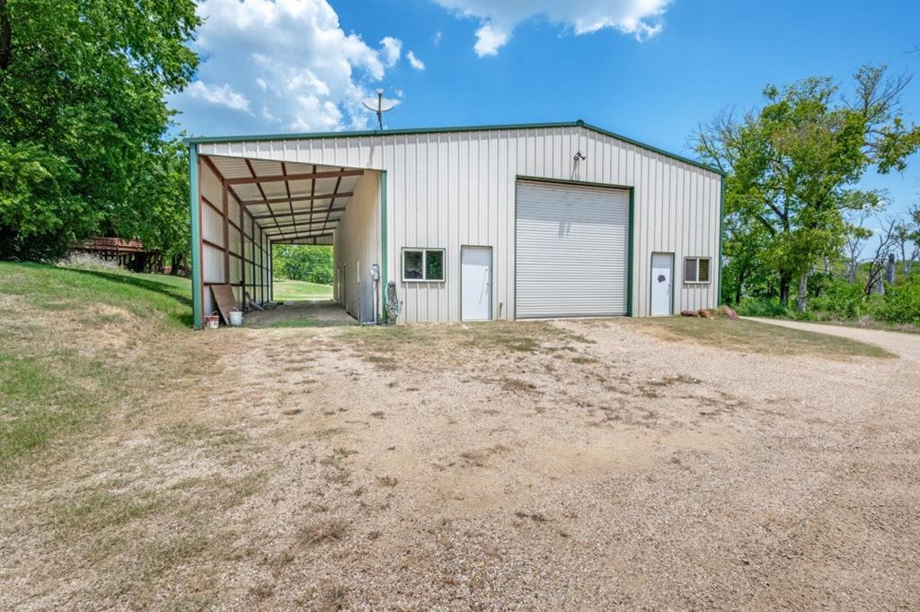 2396 Riverside Drive Denton, TX 76208 - Photo 20 of 39 Workshop with covered RV storage