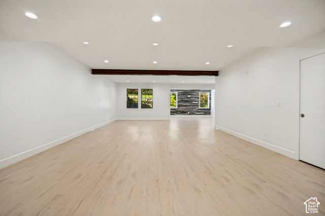 259 Twin River Loop Alpine, UT 84004 - Photo 40 of 61 Recessed ceiling lighting, wood-finish flooring, exposed wood beam, multiple windows, and a white interior door