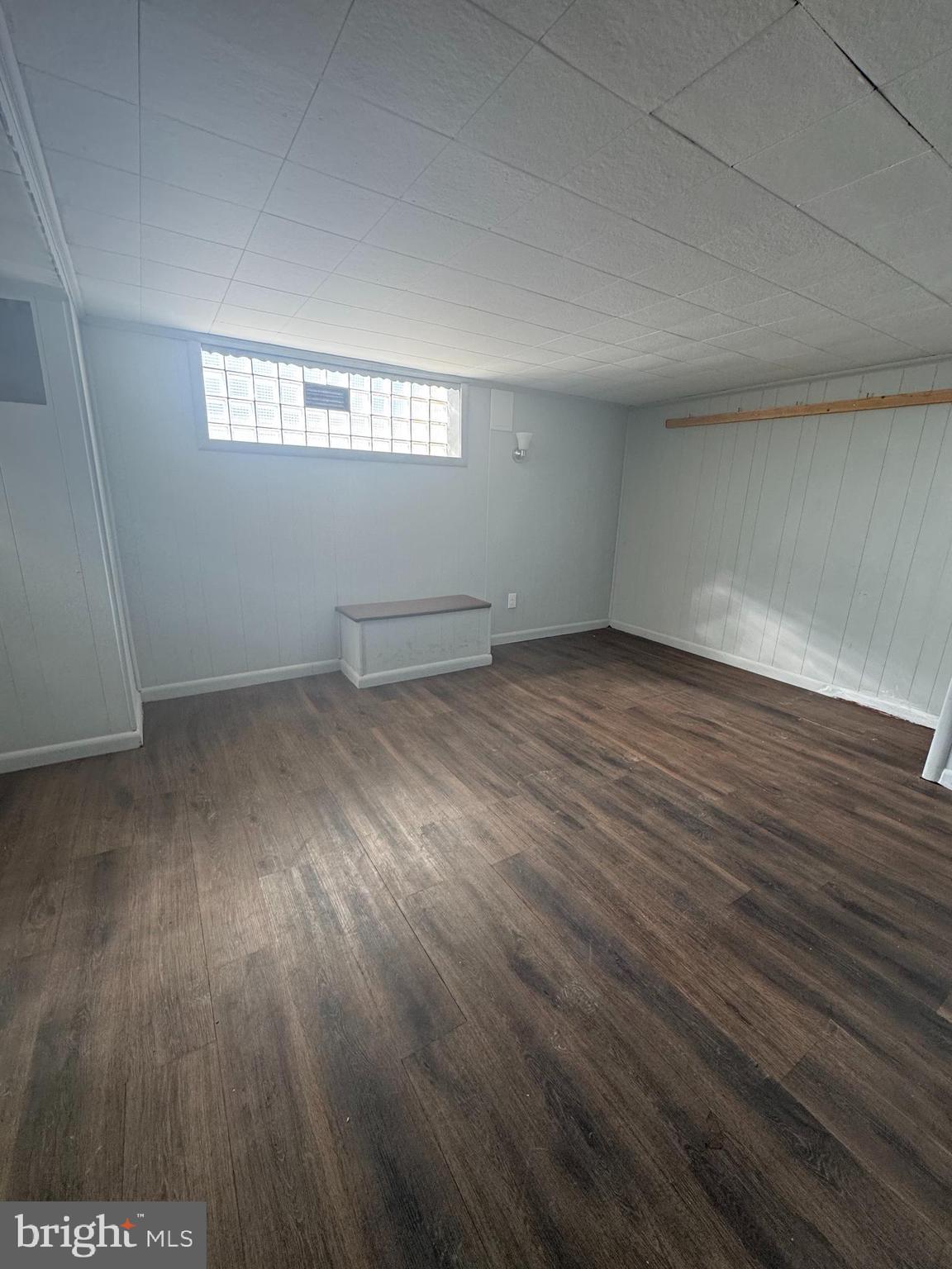 4215 Lansing Street Philadelphia, PA 19136 - Photo 11 of 14 an empty room with wooden floor and windows