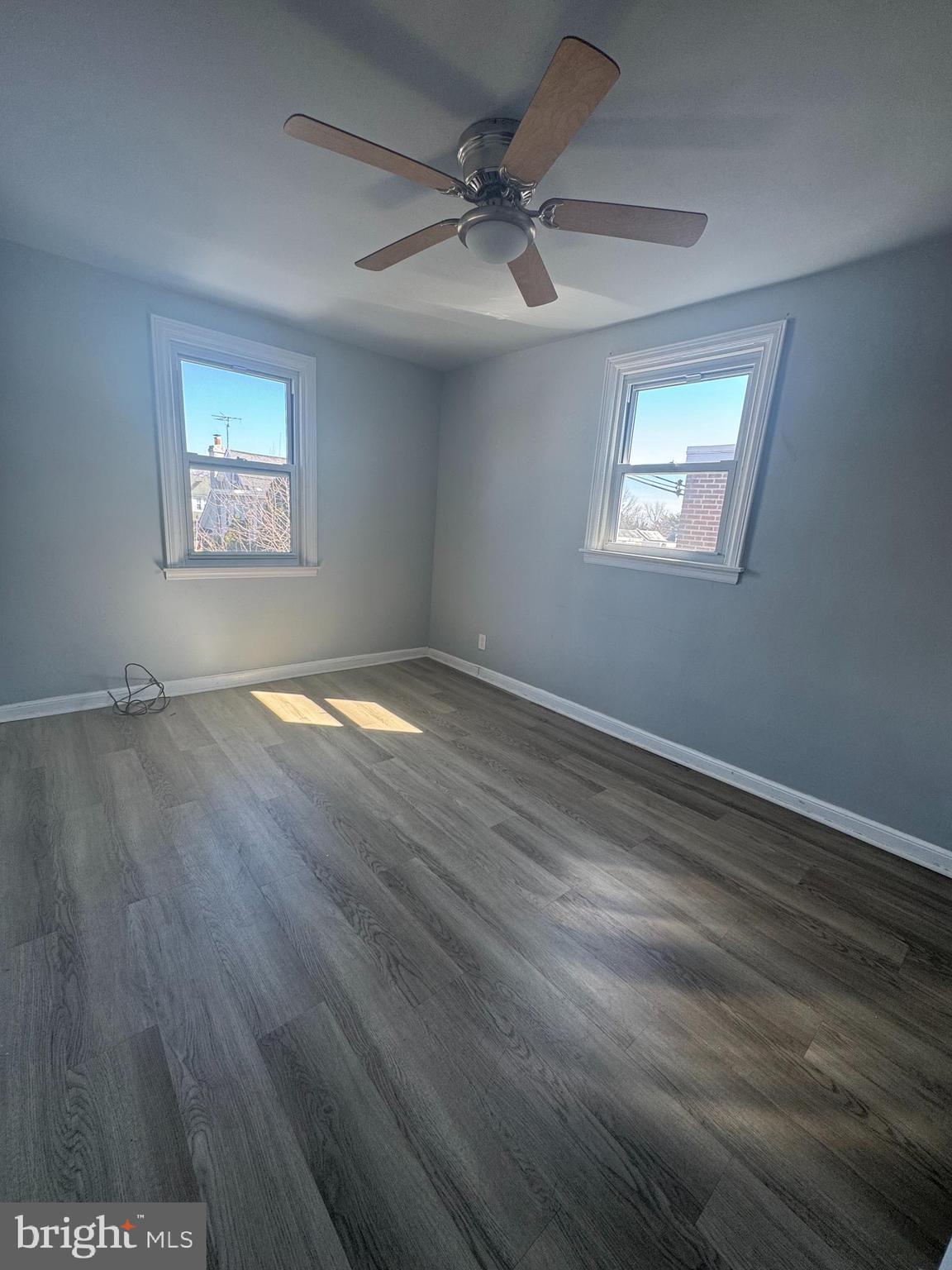 4215 Lansing Street Philadelphia, PA 19136 - Photo 7 of 14 wooden floor in an empty room with a window