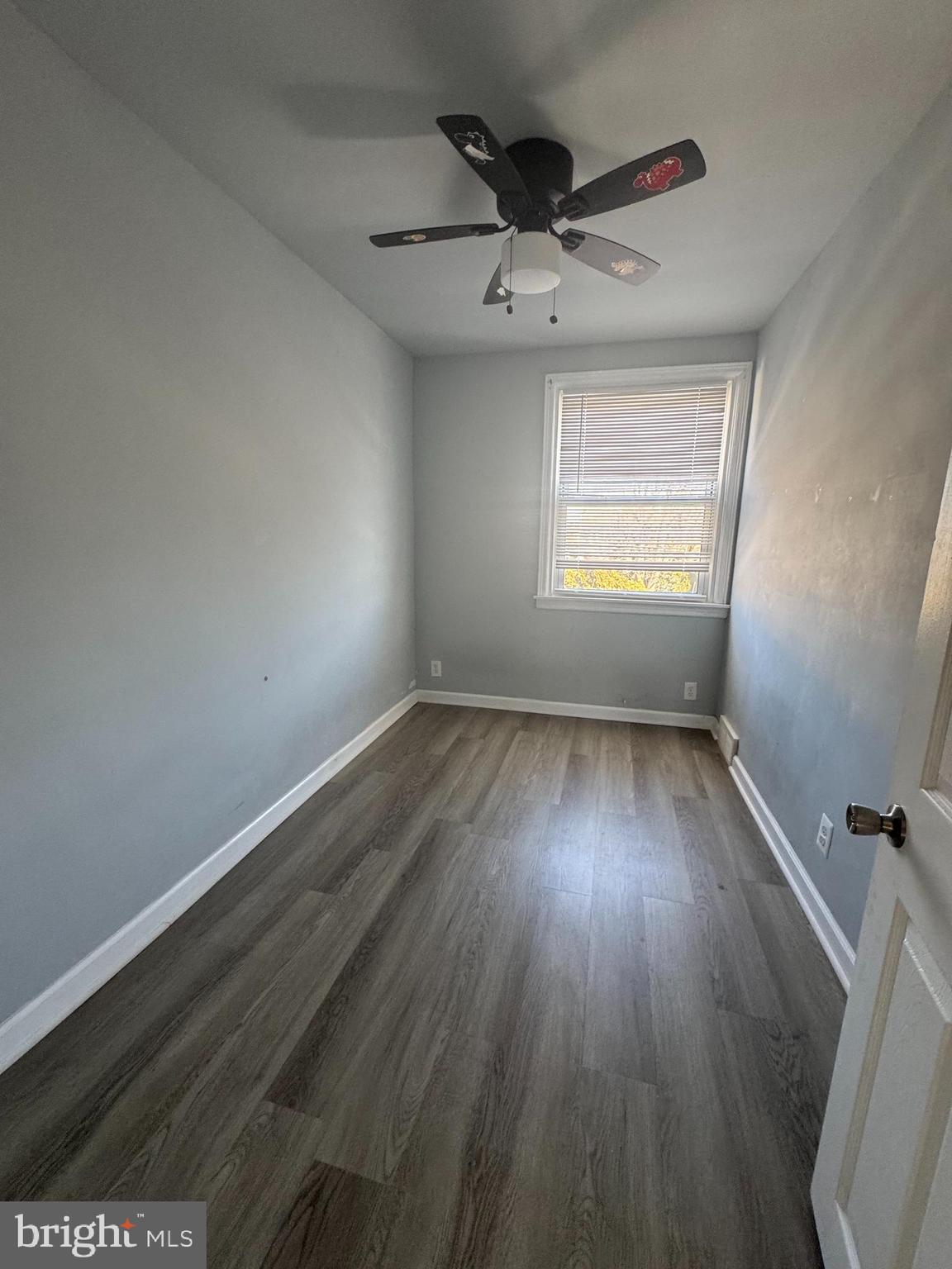 4215 Lansing Street Philadelphia, PA 19136 - Photo 8 of 14 an empty room with wooden floor and windows