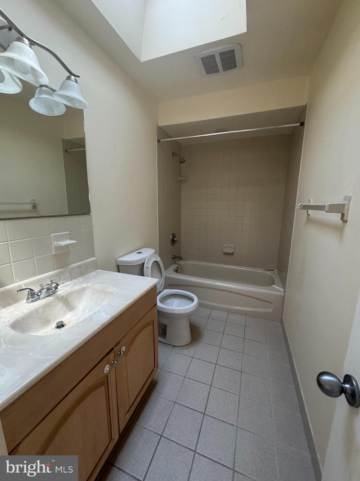 4215 Lansing Street Philadelphia, PA 19136 - Photo 9 of 14 a bathroom with a sink a toilet and shower