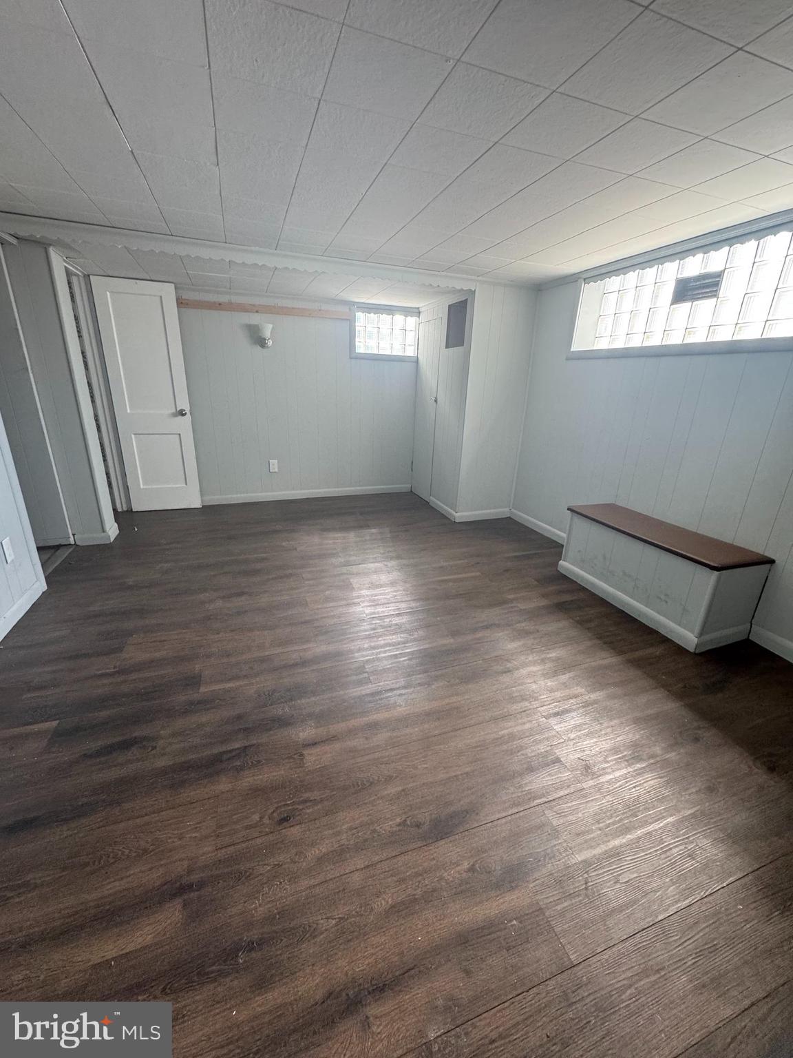 4215 Lansing Street Philadelphia, PA 19136 - Photo 10 of 14 an empty room with wooden floor and windows