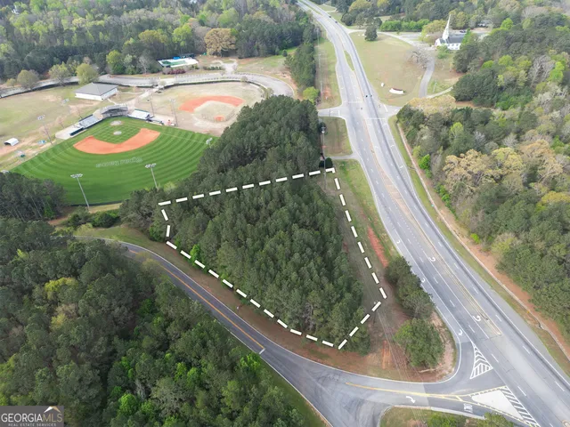 a view of swimming pool from a balcony