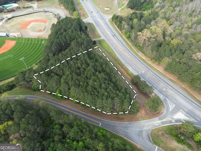 a view of swimming pool from a balcony