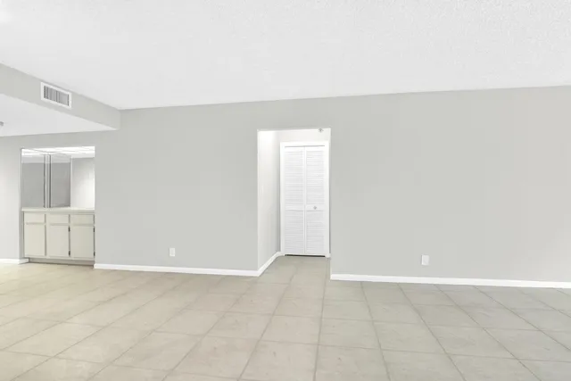 an empty room with a natural light
