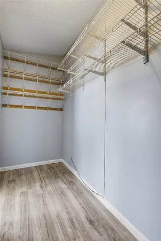 a view of a room with racks on the wall