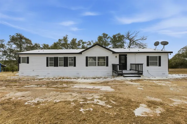 a view of a house with a patio