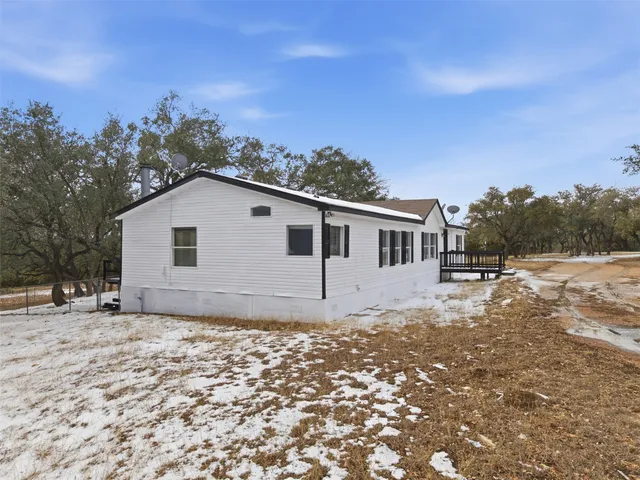 a view of kitchen with wooden floor