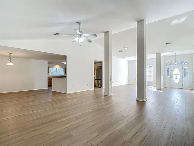 a kitchen with sink and cabinets