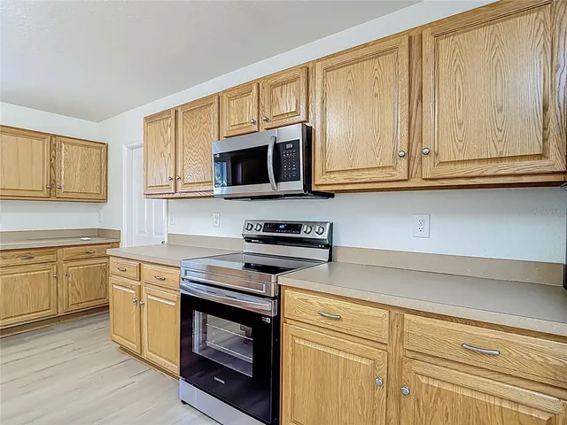 a bathroom with a sink a mirror and a shower