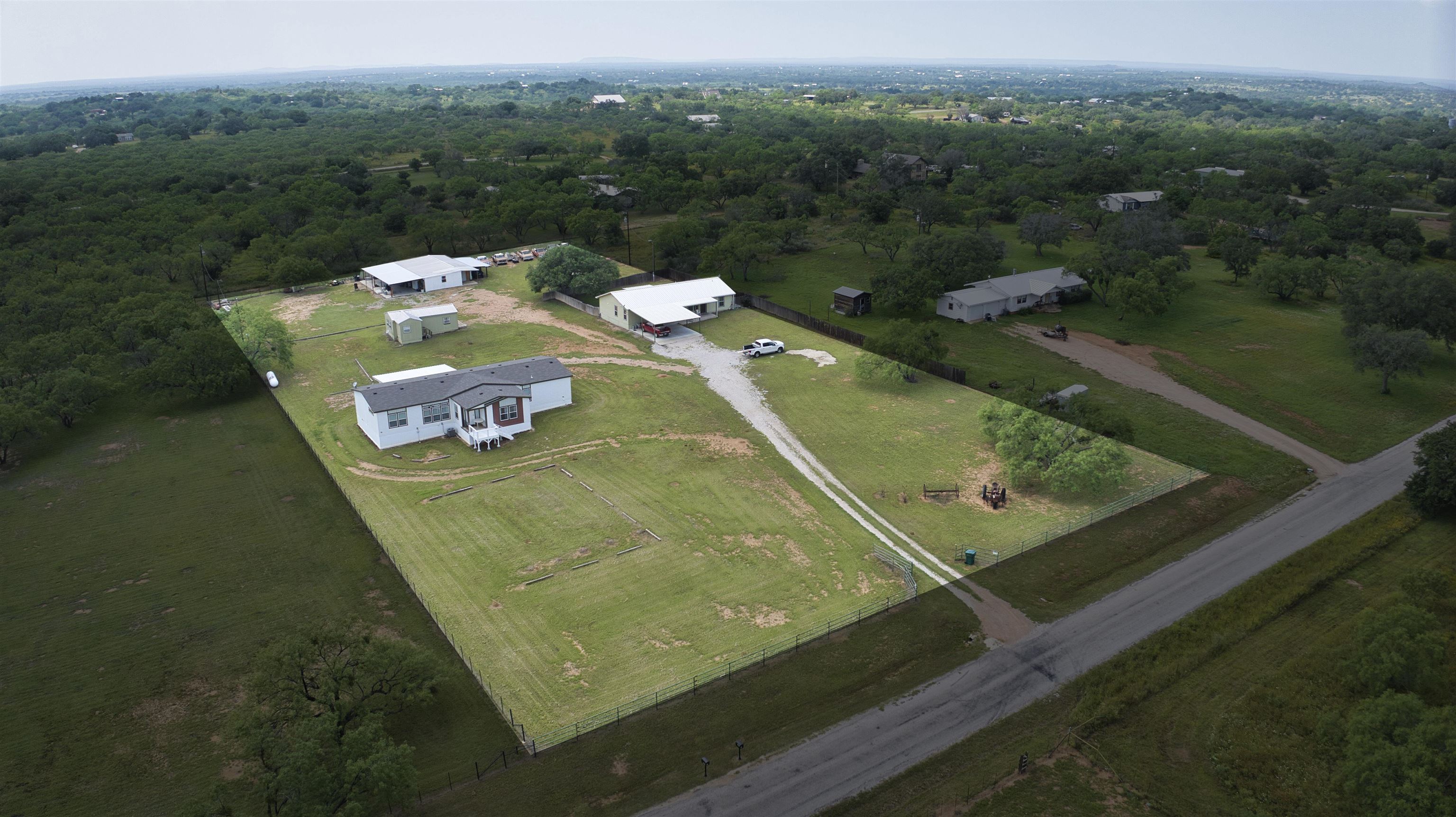 a view of a pool with a yard