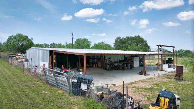 a front view of house with yard and seating area